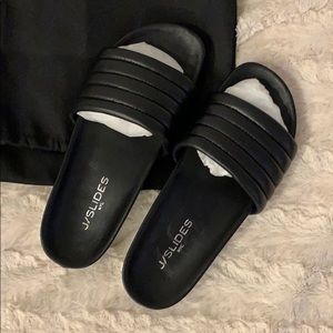 J Slides black leather sandals